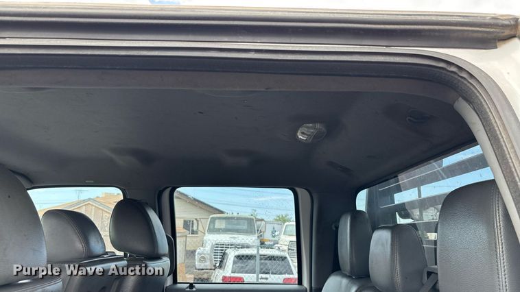 image for item FB9438 2014 Ford F550 Super Duty Crew Cab flatbed truck