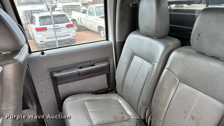 image for item FB9438 2014 Ford F550 Super Duty Crew Cab flatbed truck