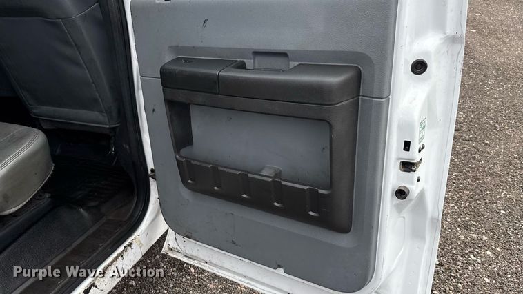 image for item FB9438 2014 Ford F550 Super Duty Crew Cab flatbed truck