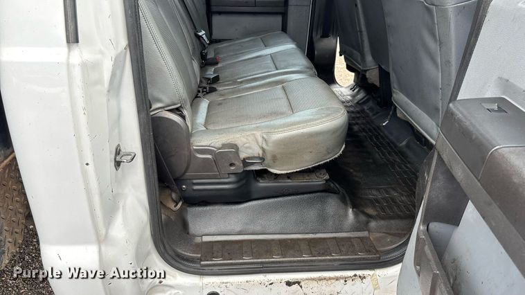 image for item FB9438 2014 Ford F550 Super Duty Crew Cab flatbed truck