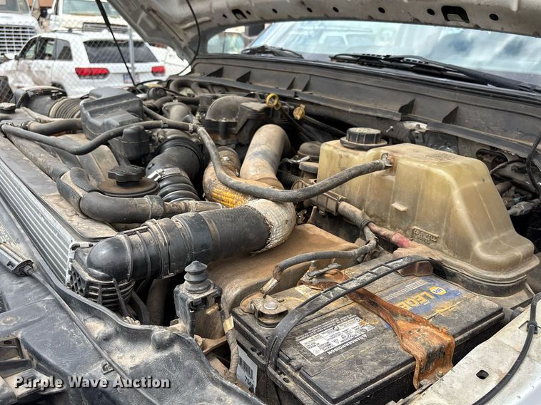 image for item FB9438 2014 Ford F550 Super Duty Crew Cab flatbed truck