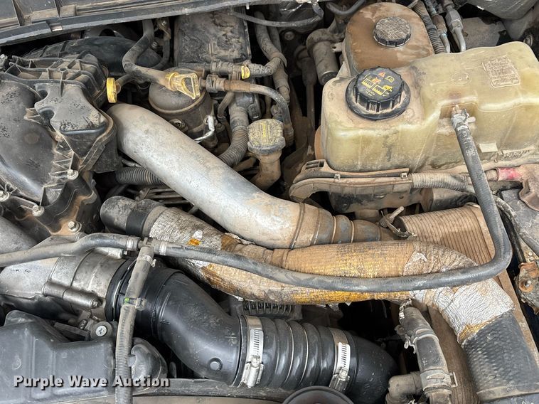 image for item FB9438 2014 Ford F550 Super Duty Crew Cab flatbed truck