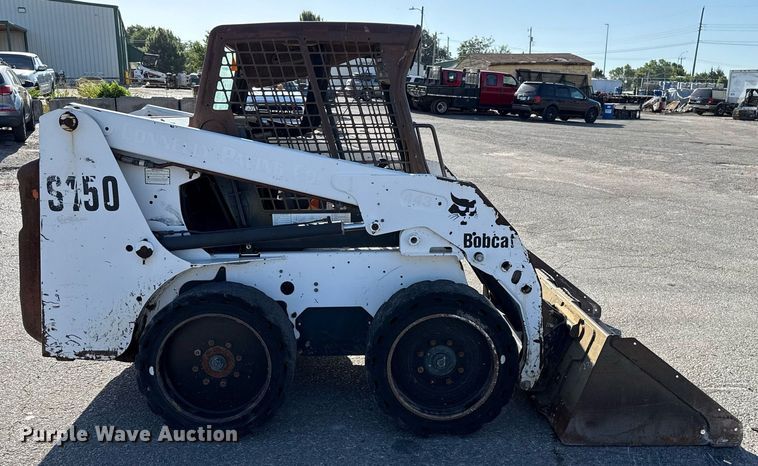 MINI CARGADOR SOBRE RUEDAS 2004 BOBCAT S150