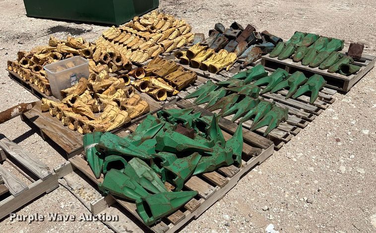 image for item DX8076 (7) pallets of bucket teeth 