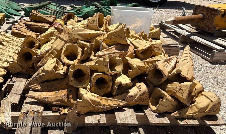 image for item DX8076 (7) pallets of bucket teeth 
