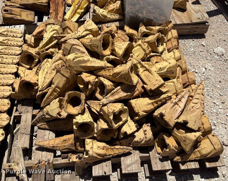 image for item DX8076 (7) pallets of bucket teeth 