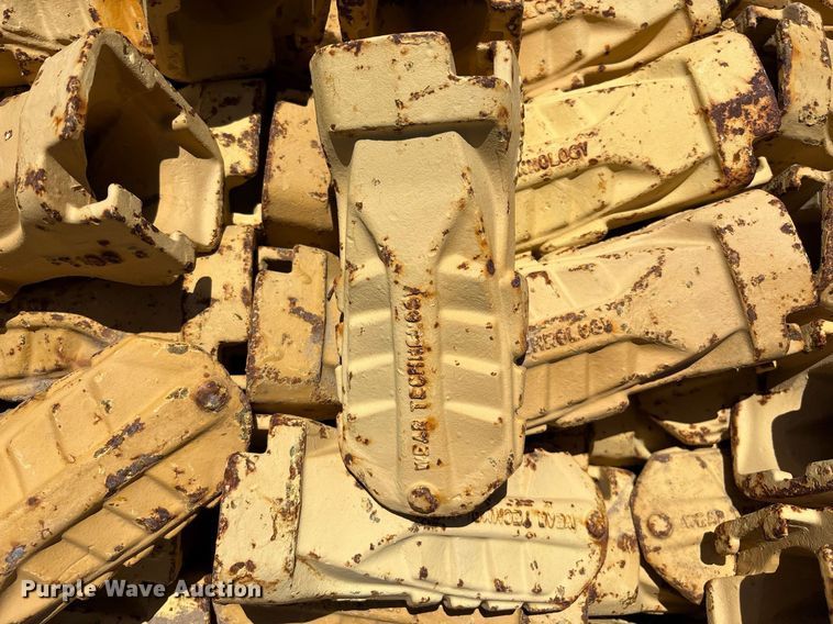 image for item DX8076 (7) pallets of bucket teeth 