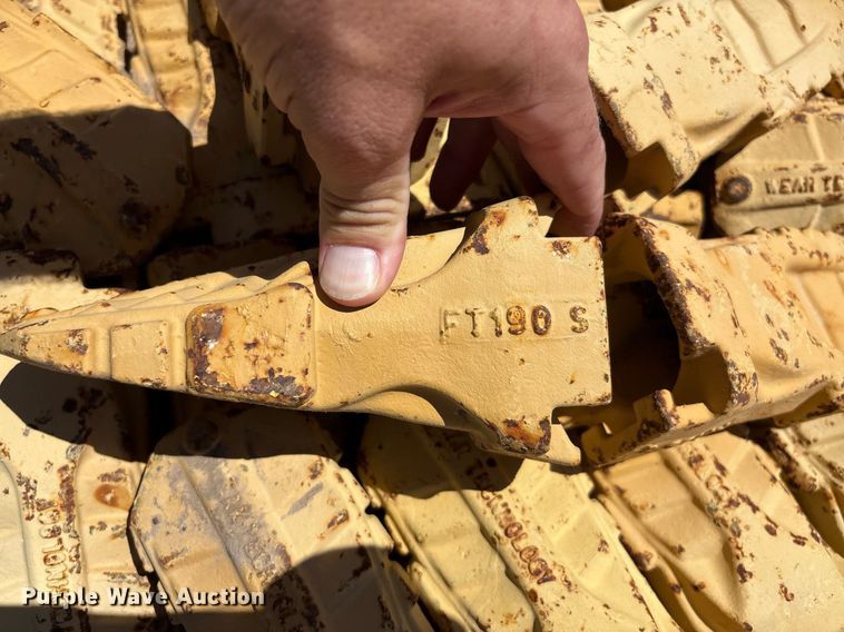 image for item DX8076 (7) pallets of bucket teeth 