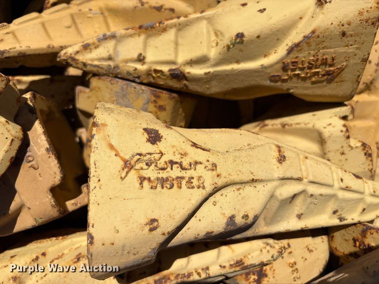 image for item DX8076 (7) pallets of bucket teeth 