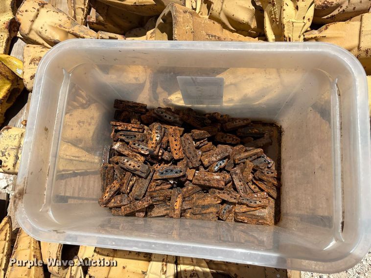 image for item DX8076 (7) pallets of bucket teeth 