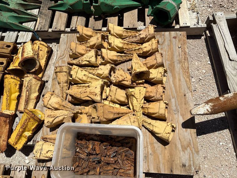 image for item DX8076 (7) pallets of bucket teeth 