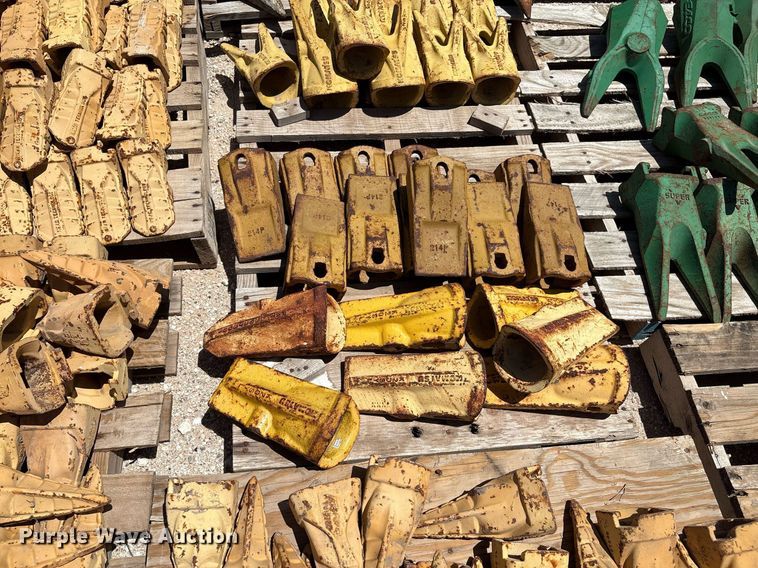 image for item DX8076 (7) pallets of bucket teeth 