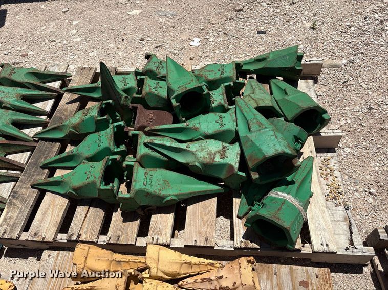 image for item DX8076 (7) pallets of bucket teeth 
