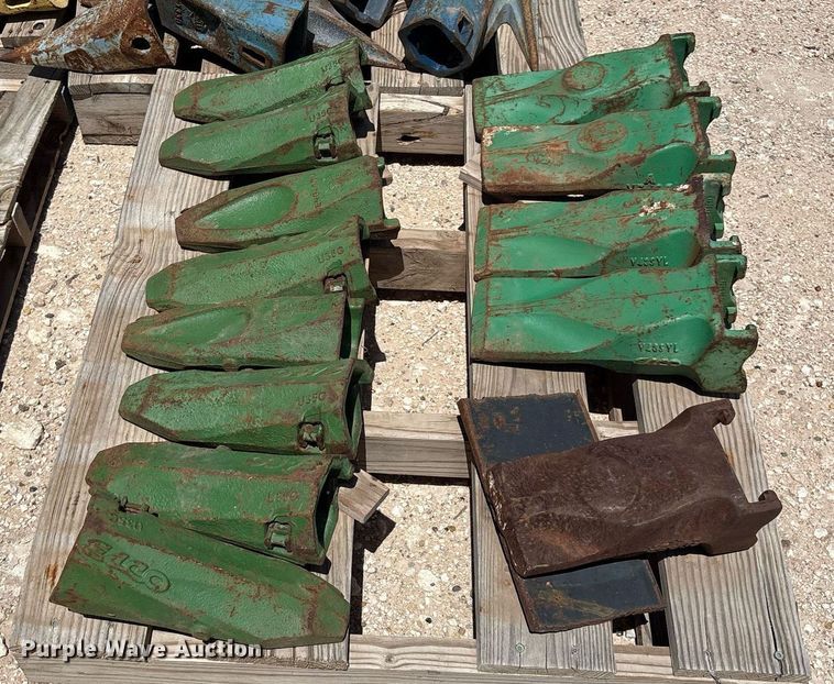 image for item DX8076 (7) pallets of bucket teeth 