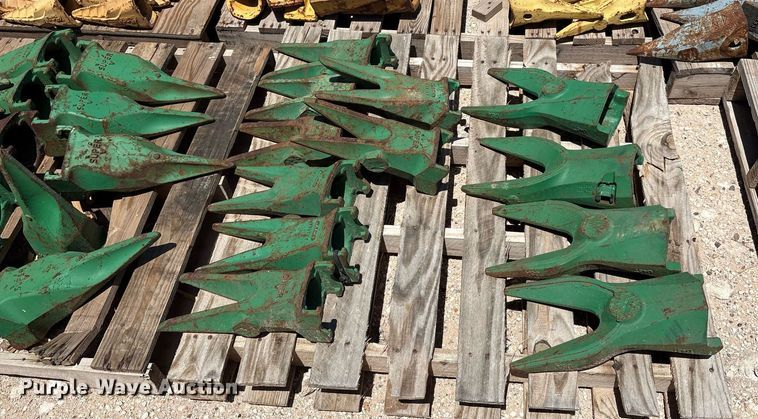 image for item DX8076 (7) pallets of bucket teeth 