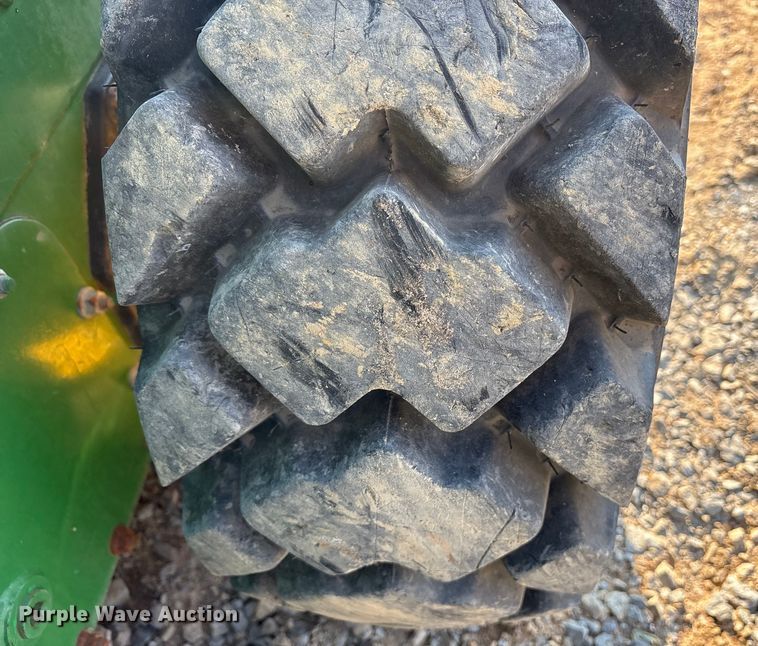 image for item DY0911 2000 John Deere 240 skid steer loader