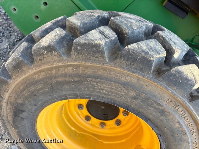 image for item DY0911 2000 John Deere 240 skid steer loader