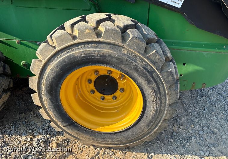 image for item DY0911 2000 John Deere 240 skid steer loader