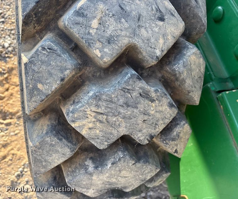 image for item DY0911 2000 John Deere 240 skid steer loader