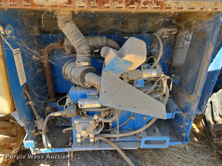 image for item EC1105 2001 Genie GS-3268 RT scissor lift