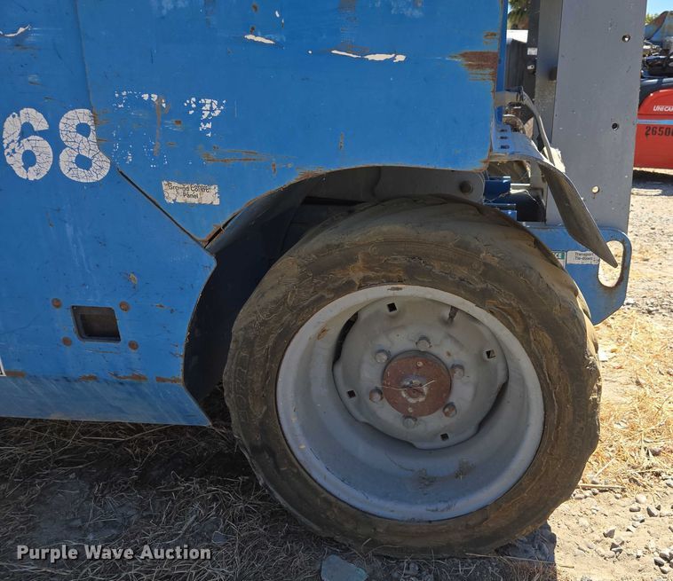 image for item EC1105 2001 Genie GS-3268 RT scissor lift