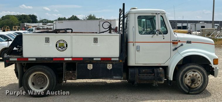 image for item EK8440 1999 International 4700 Low Profile flatbed truck