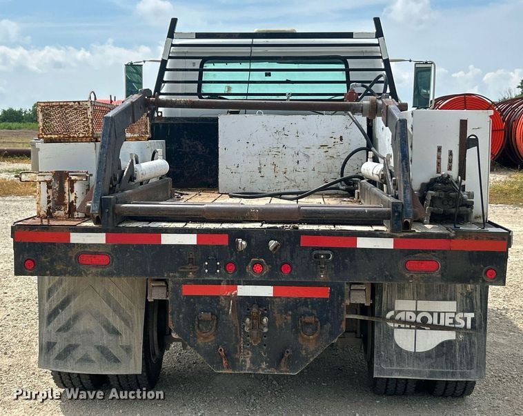 image for item EK8440 1999 International 4700 Low Profile flatbed truck