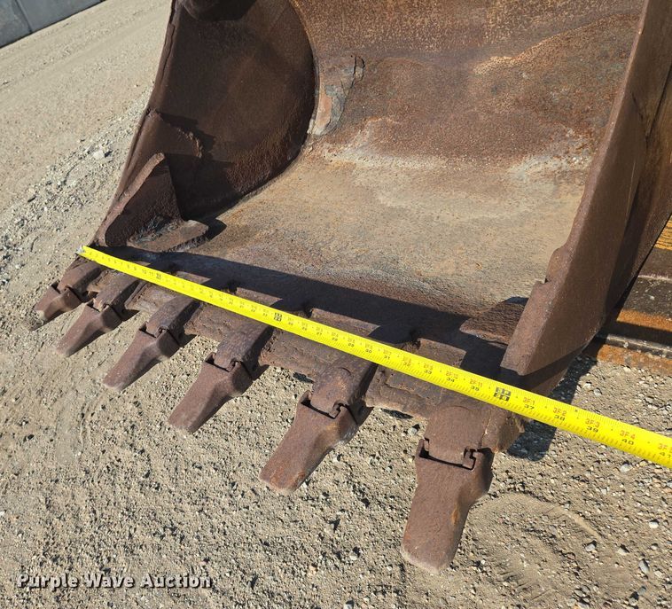 image for item EN8327 1999 John Deere 310E backhoe