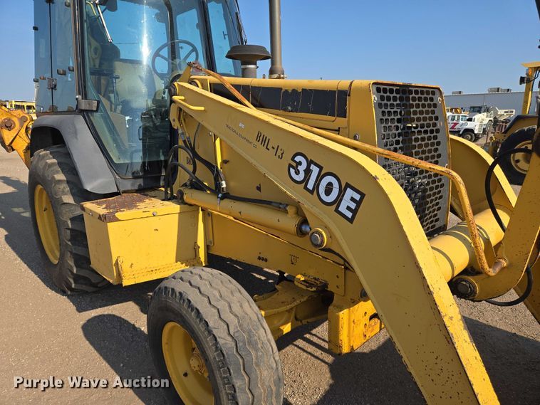 image for item EN8327 1999 John Deere 310E backhoe