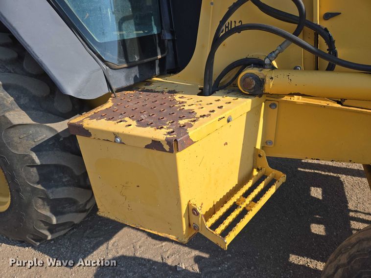 image for item EN8327 1999 John Deere 310E backhoe