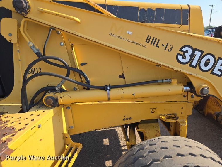 image for item EN8327 1999 John Deere 310E backhoe