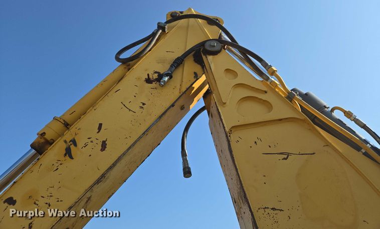 image for item EN8327 1999 John Deere 310E backhoe
