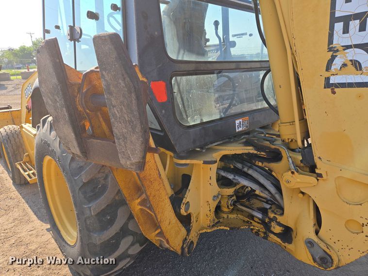 image for item EN8327 1999 John Deere 310E backhoe