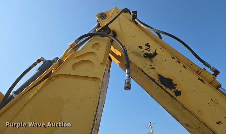 image for item EN8327 1999 John Deere 310E backhoe