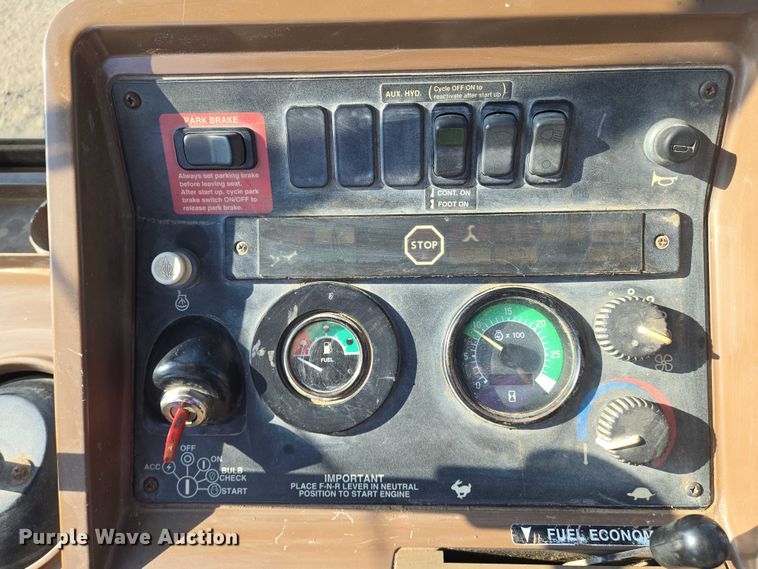 image for item EN8327 1999 John Deere 310E backhoe