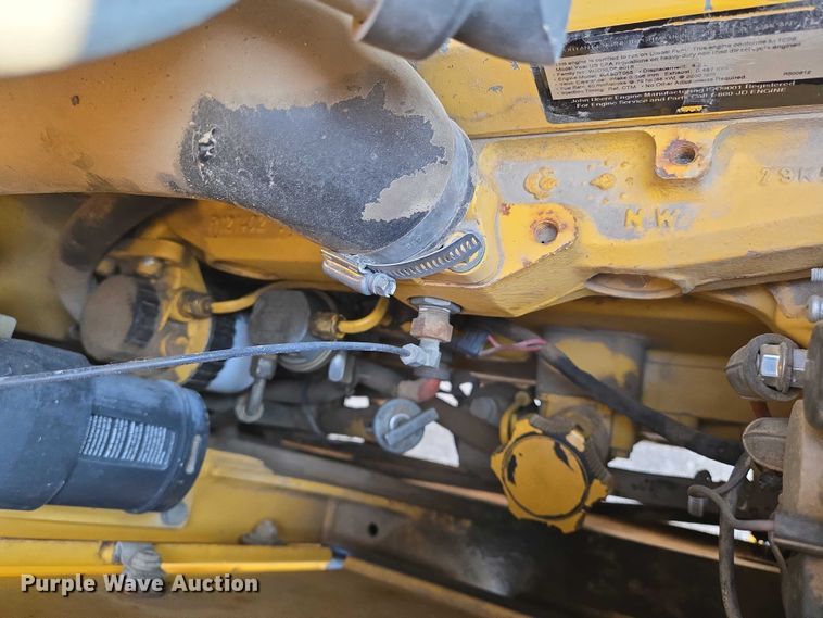 image for item EN8327 1999 John Deere 310E backhoe