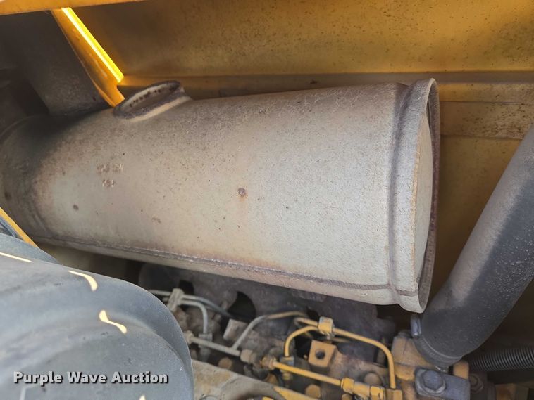 image for item EN8327 1999 John Deere 310E backhoe