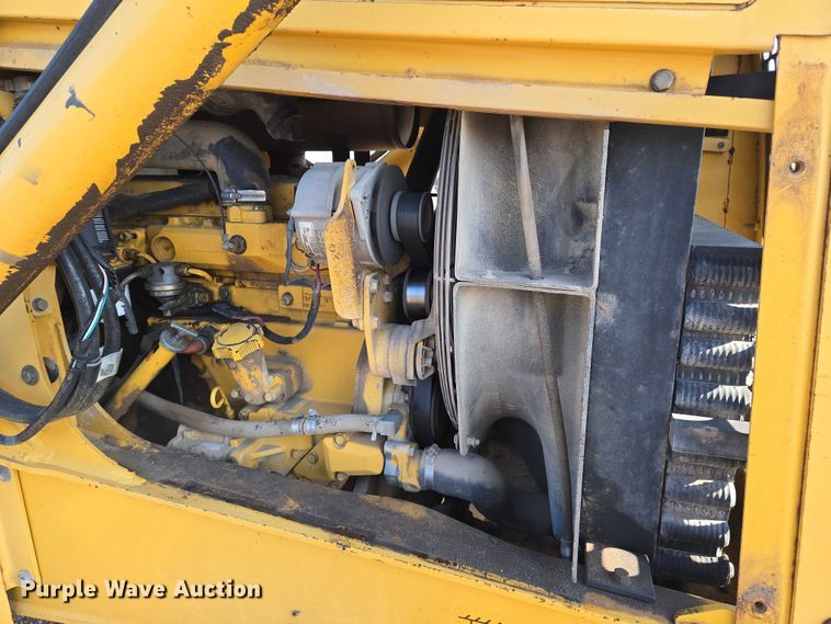 image for item EN8327 1999 John Deere 310E backhoe