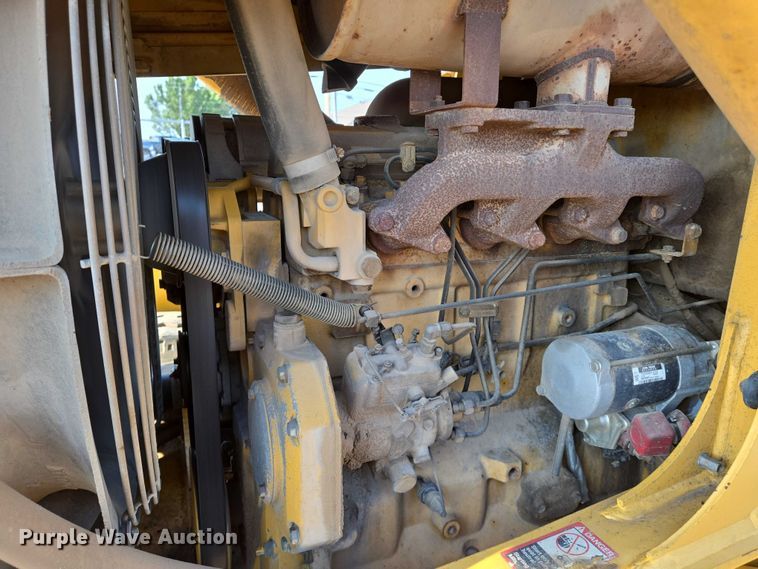 image for item EN8327 1999 John Deere 310E backhoe