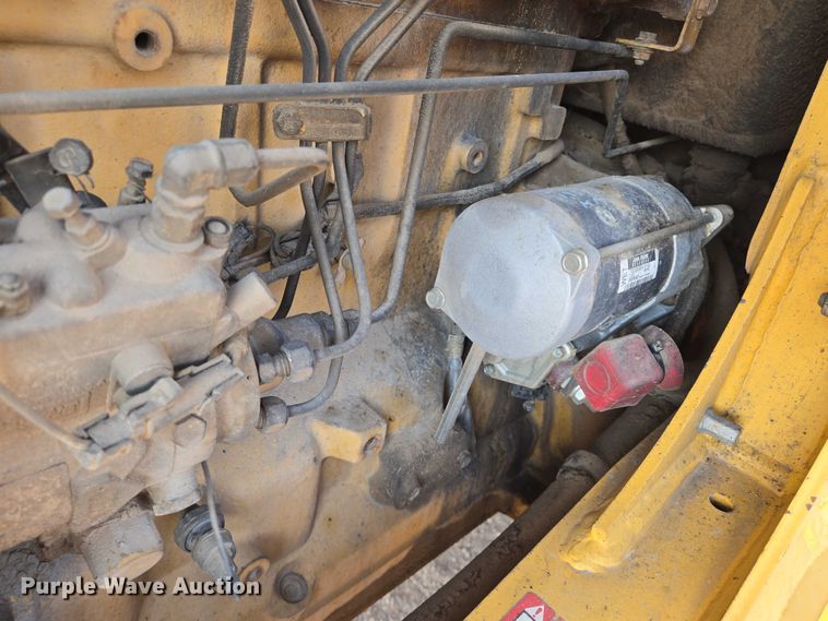 image for item EN8327 1999 John Deere 310E backhoe