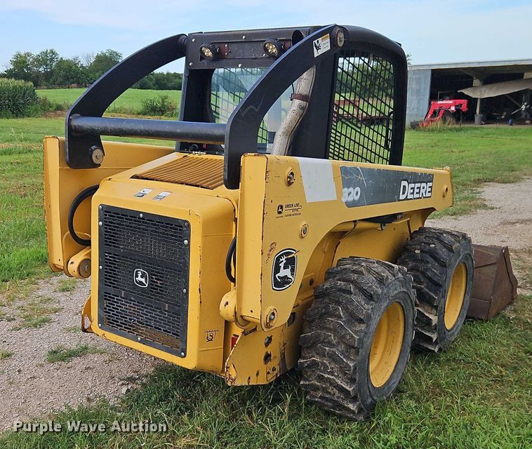 MINI CARGADOR SOBRE RUEDAS 2005 JOHN DEERE 320