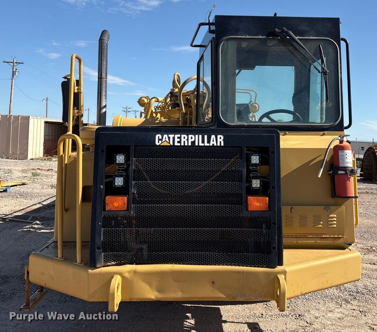 image for item ES7004 2007 Caterpillar 613C water wagon