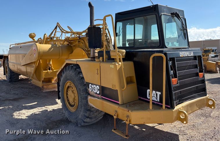 image for item ES7004 2007 Caterpillar 613C water wagon