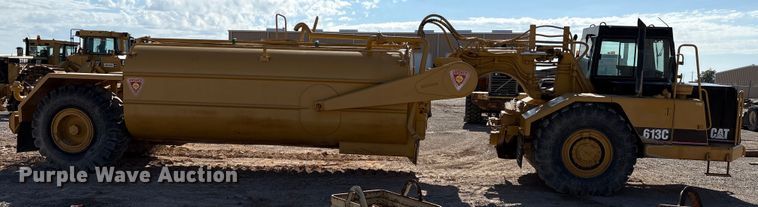 image for item ES7004 2007 Caterpillar 613C water wagon