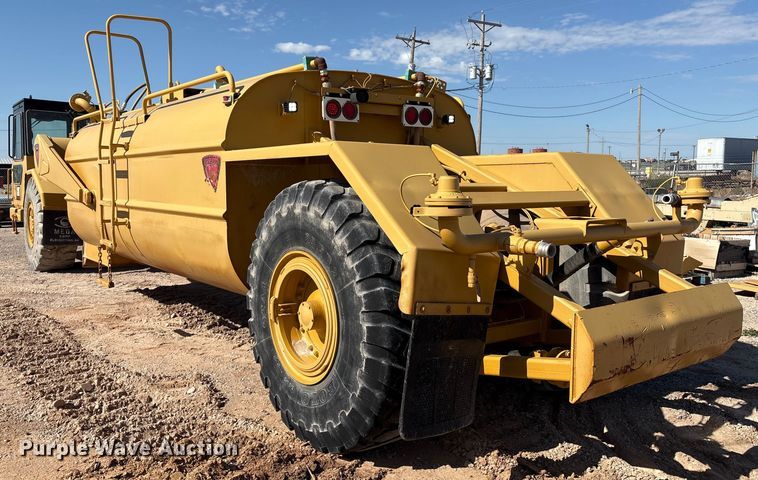 image for item ES7004 2007 Caterpillar 613C water wagon