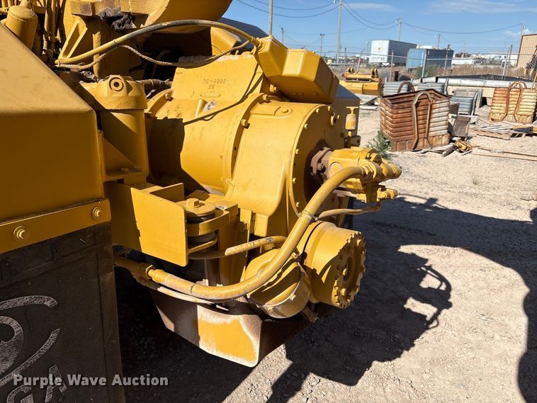 image for item ES7004 2007 Caterpillar 613C water wagon