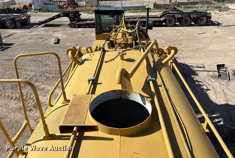 image for item ES7004 2007 Caterpillar 613C water wagon