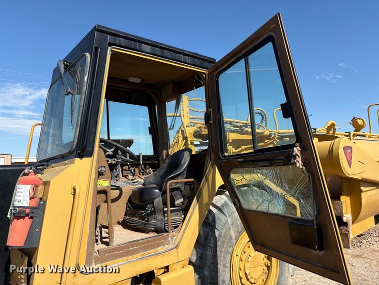 image for item ES7004 2007 Caterpillar 613C water wagon