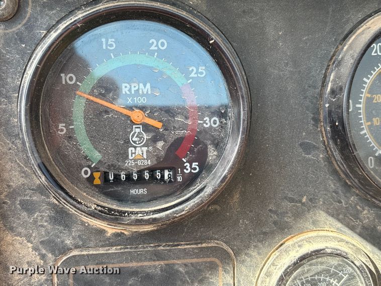 image for item ES7004 2007 Caterpillar 613C water wagon