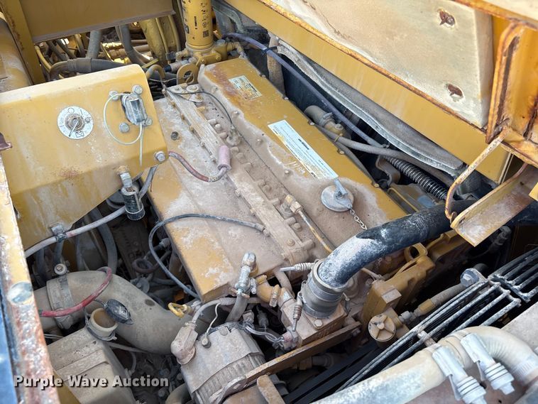 image for item ES7004 2007 Caterpillar 613C water wagon
